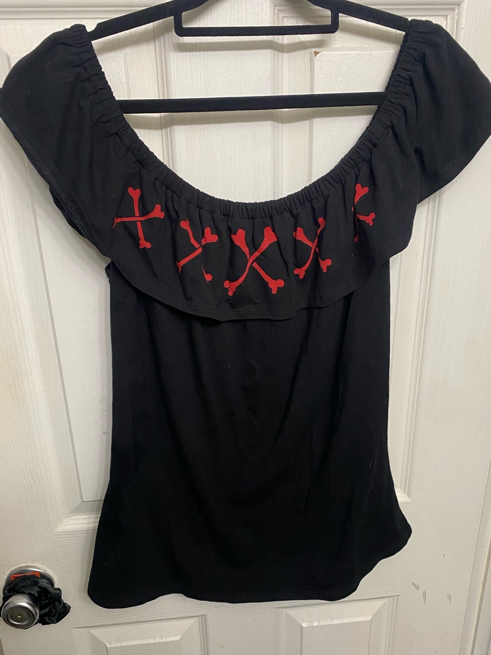 Kreepsville 666 Black Off-Shoulder Top with Red Crossbones Detail